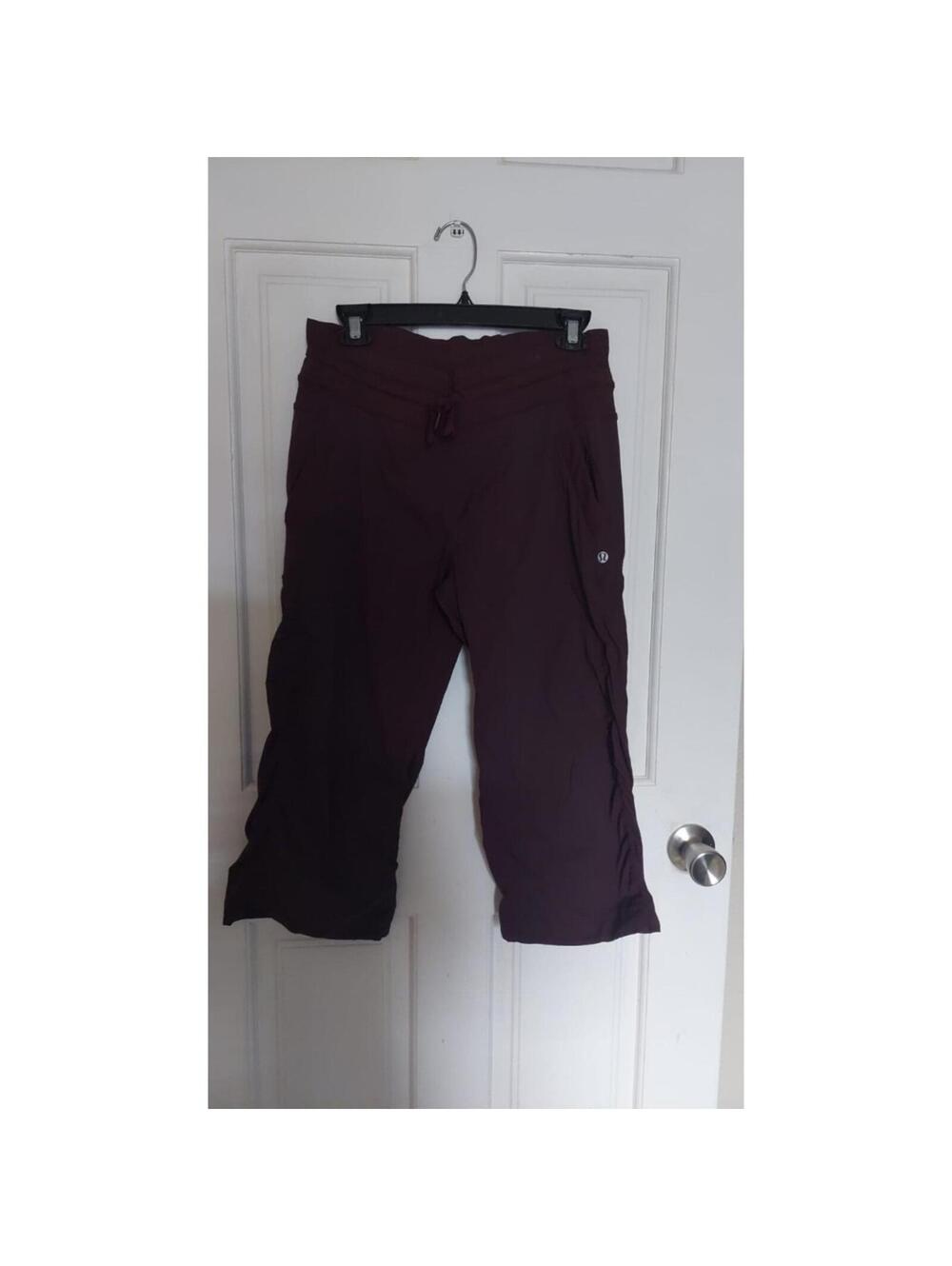 Lululemon burgundy windsuit Pants Sz 8 burgundy / maroon pockets Crop  Wmns
